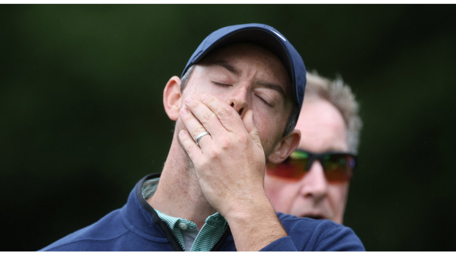 WATCH: Rory McIlroy's father offers an expletive after slicing tee shot